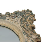 Miroir sculpté et patiné