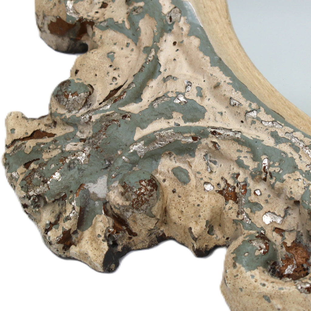 Miroir sculpté et patiné