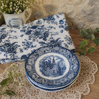 Soucoupes vintage en faïence anglaise avec décor village ancien et clocher, esprit campagne chic