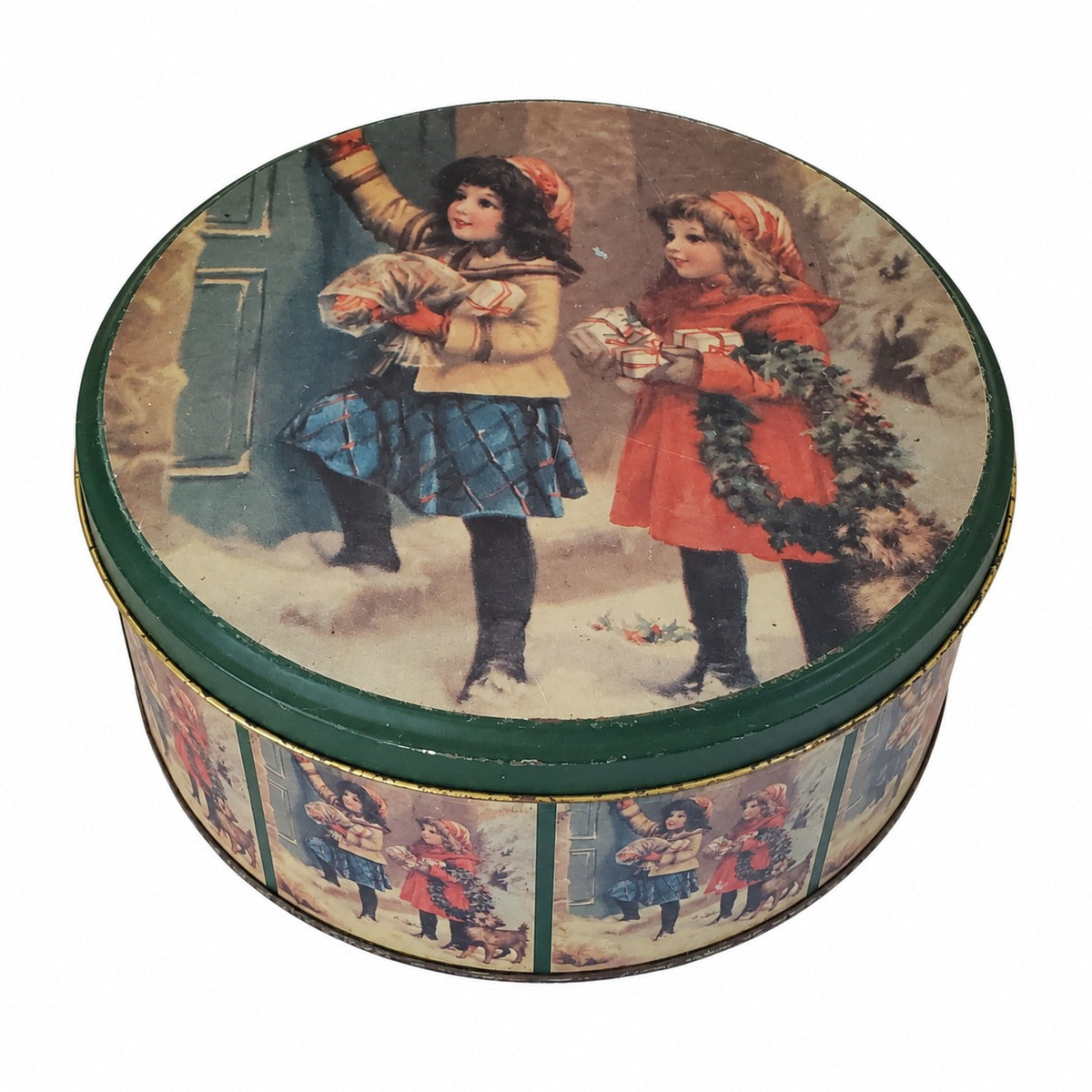 Boîte ronde en métal vintage à décor d’enfants dans une scène de Noël ancienne