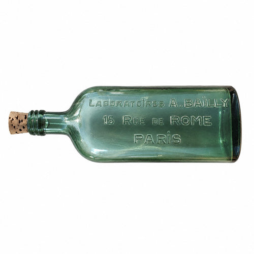 Bouteille pharmaceutique ancienne en verre