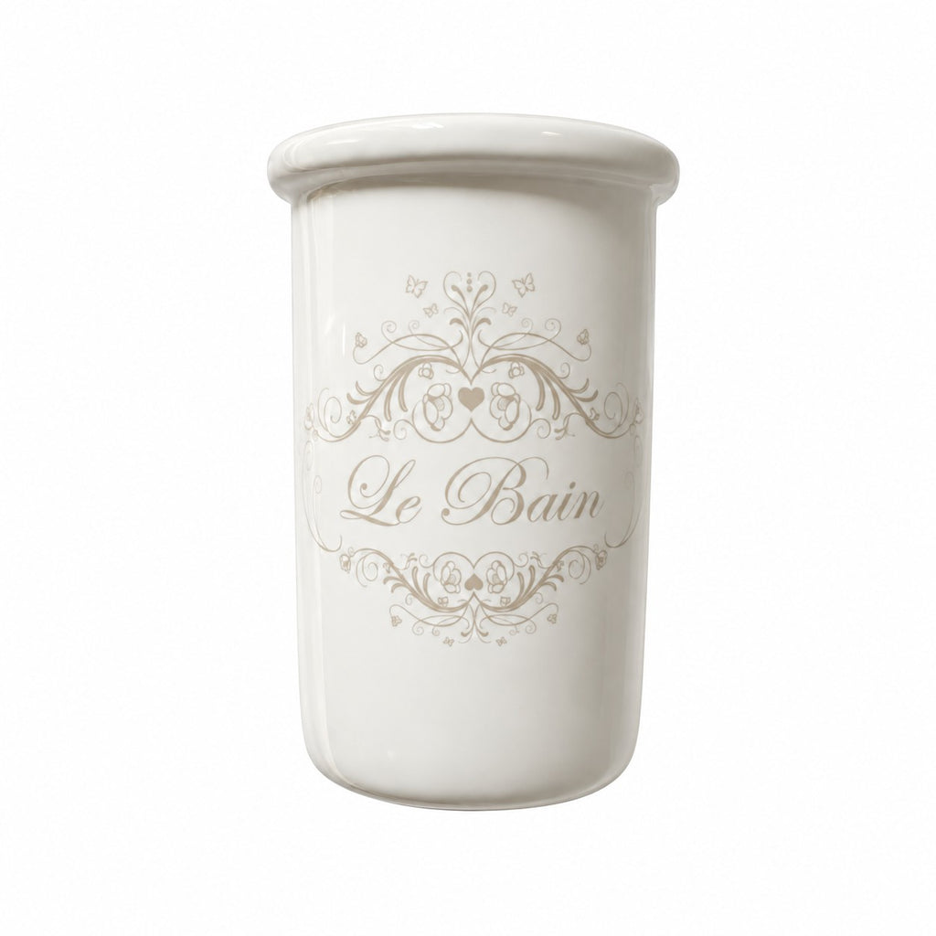 Pot à brosses à dents en céramique blanche avec inscription « Le Bain », style maison de charme.