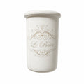 Pot à brosses à dents en céramique blanche avec inscription « Le Bain », style maison de charme.