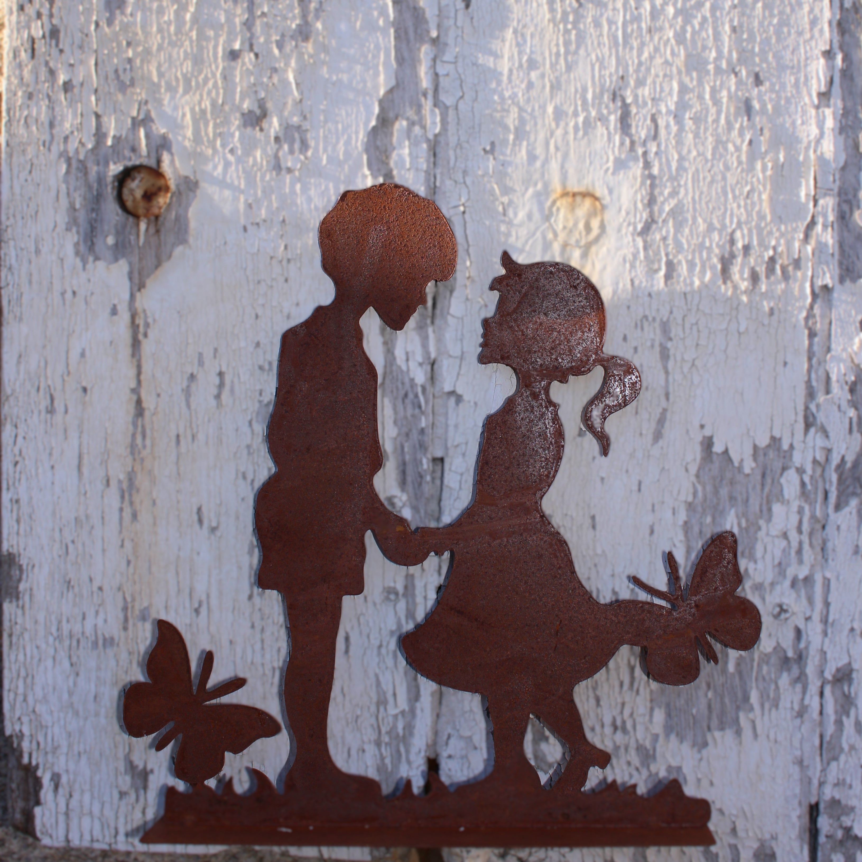 jolie sculpture en métal  avec un motif enfants pour une décoration du jardin campagne chic et maison de charme - Clayre & Eef - Maison Ysance