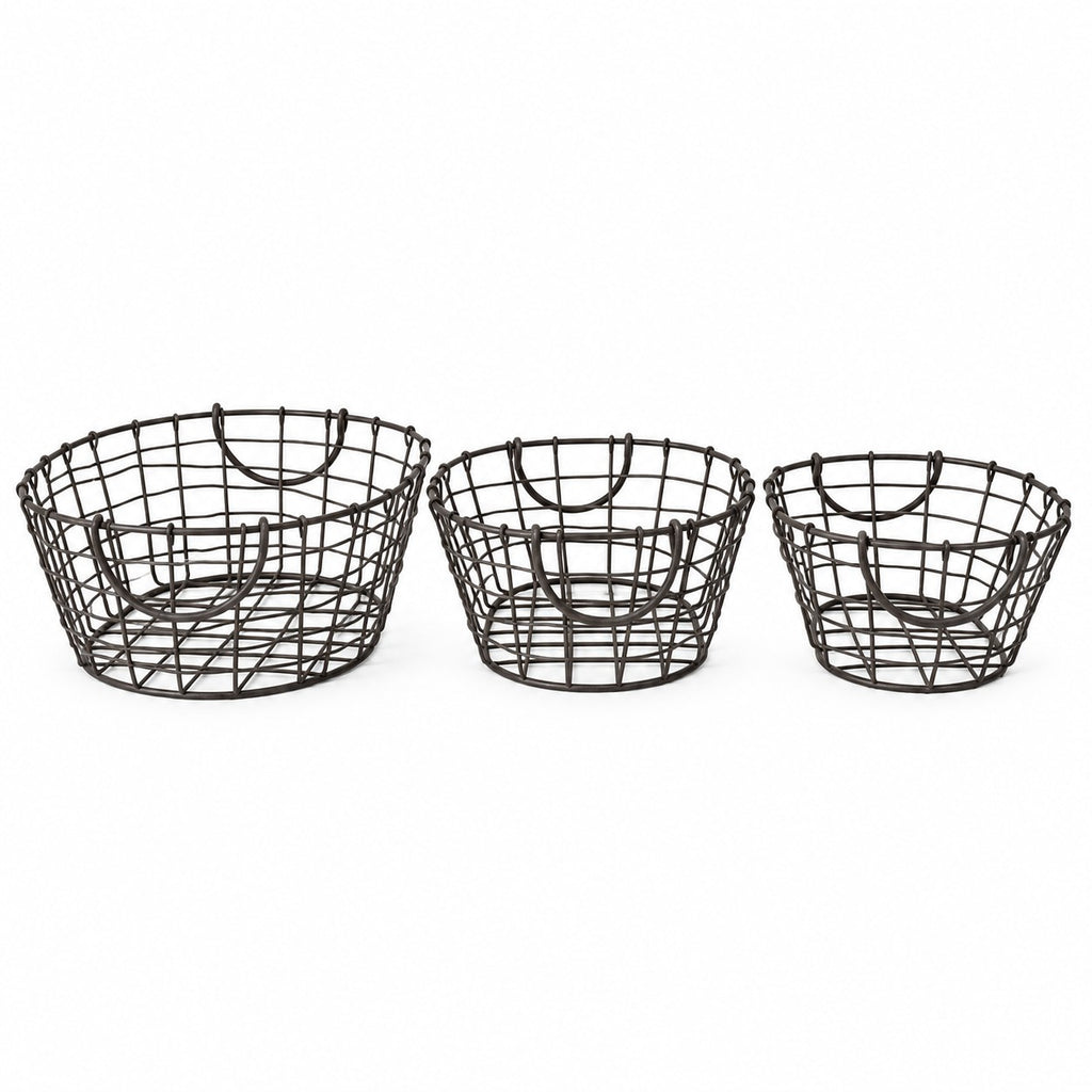 Set de trois paniers en métal filaire ovale.